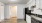 a kitchen with white cabinets