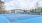 a tennis court with a fence